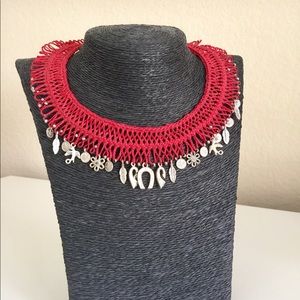 Handmade waxed knitting necklace.